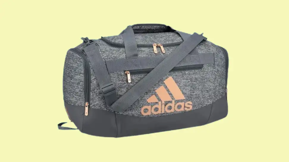 Gym bags on a blue and beige background.