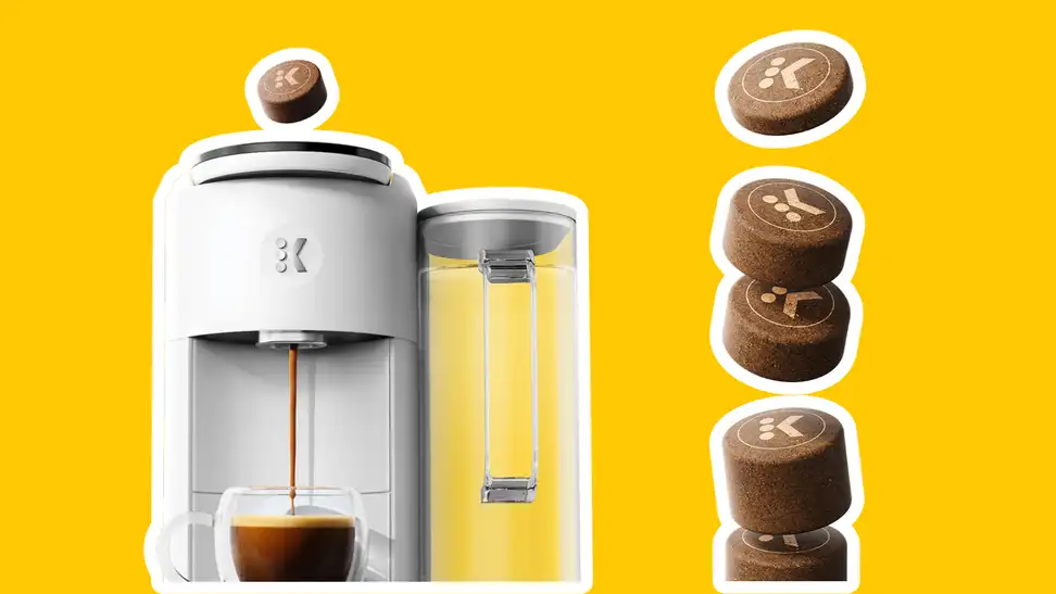 Keurig machine and stack of K-Rounds on a yellow background