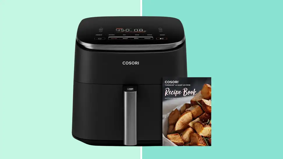 Cosori TurboBlaze air fryer on blue background