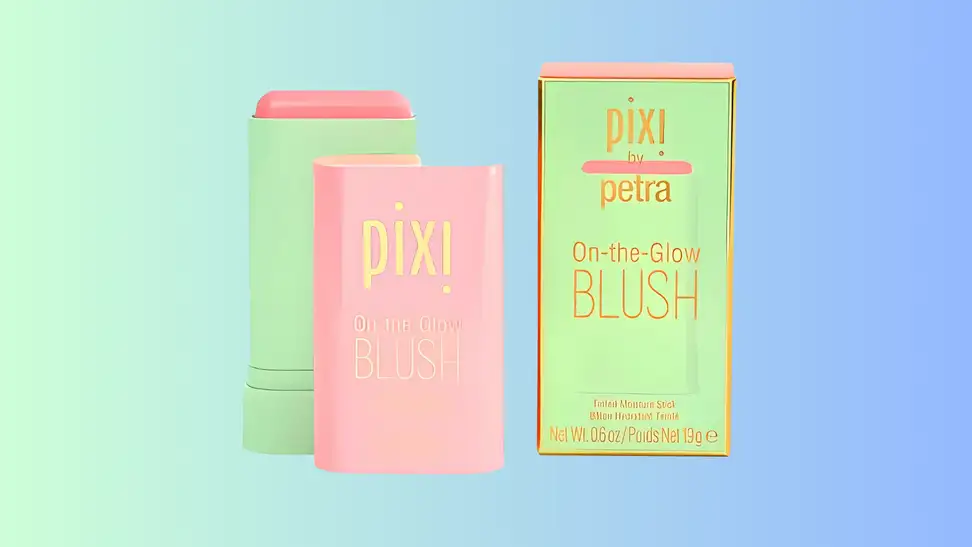 A Pixi On-the-Glow Blush stick and its packaging are displayed against a pastel gradient background.