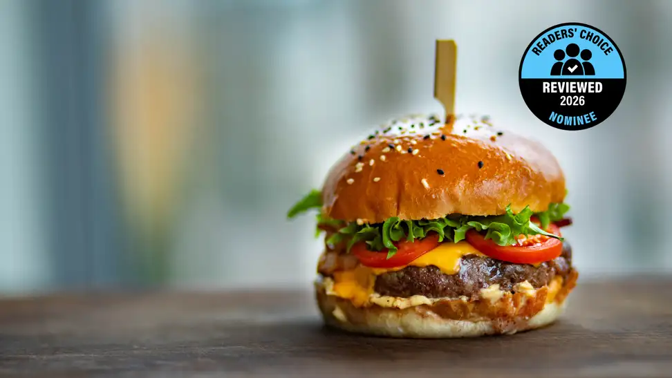 A burger sits on a table