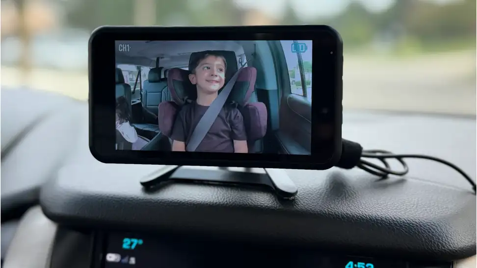 Babyvue Wireless Baby Car Monitor mounted on a dashboard.