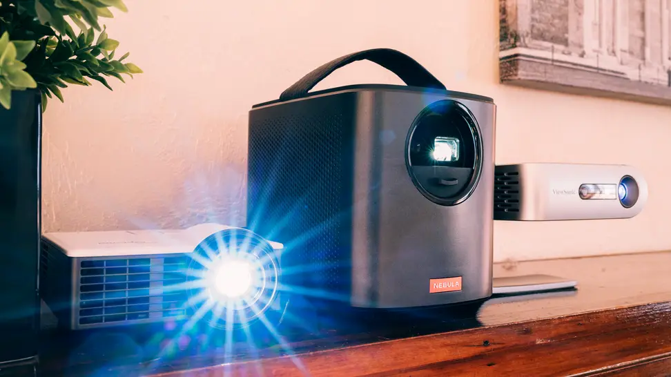 Best portable pico projectors for business, including the Anker Nebula Mars II, the Optoma ML750ST, and the ViewSonic M1