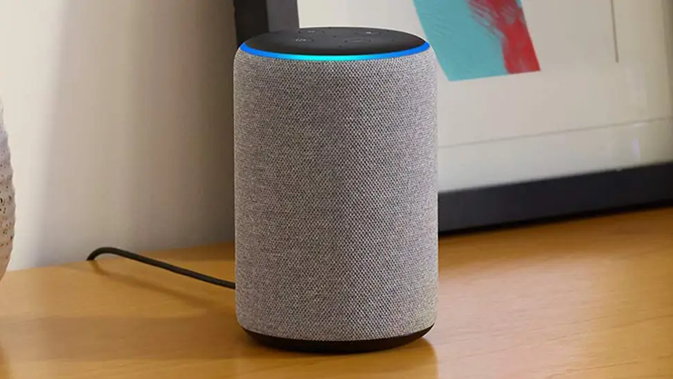Amazon Echo Plus smart speaker actively listening with blue indicator light illuminated