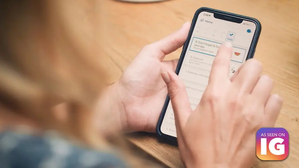A person's hands holding a smartphone