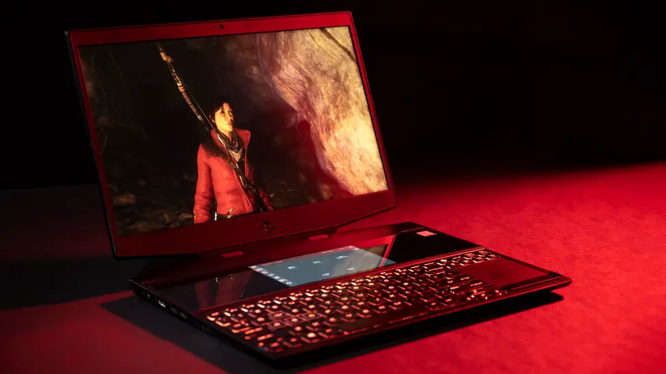 The HP Omen X 2S gaming laptop on a red and black background