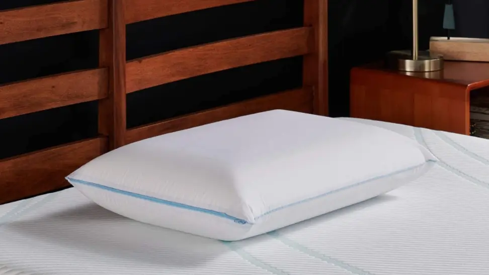 the tempur-cloud breeze pillow on a bed