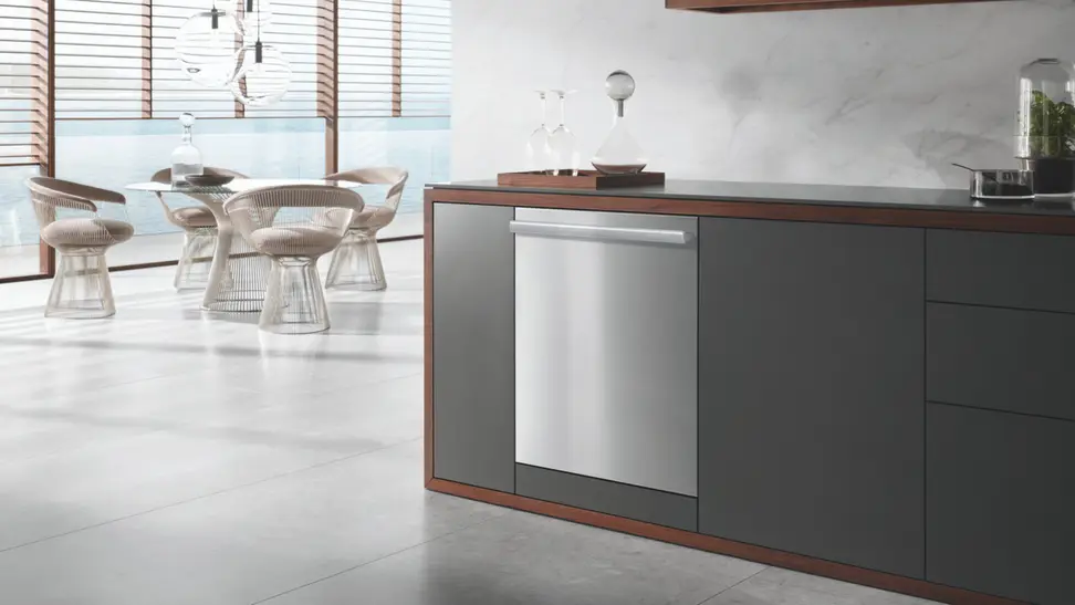 an upscale kitchen with a sleek dishwasher installed in cabinetry