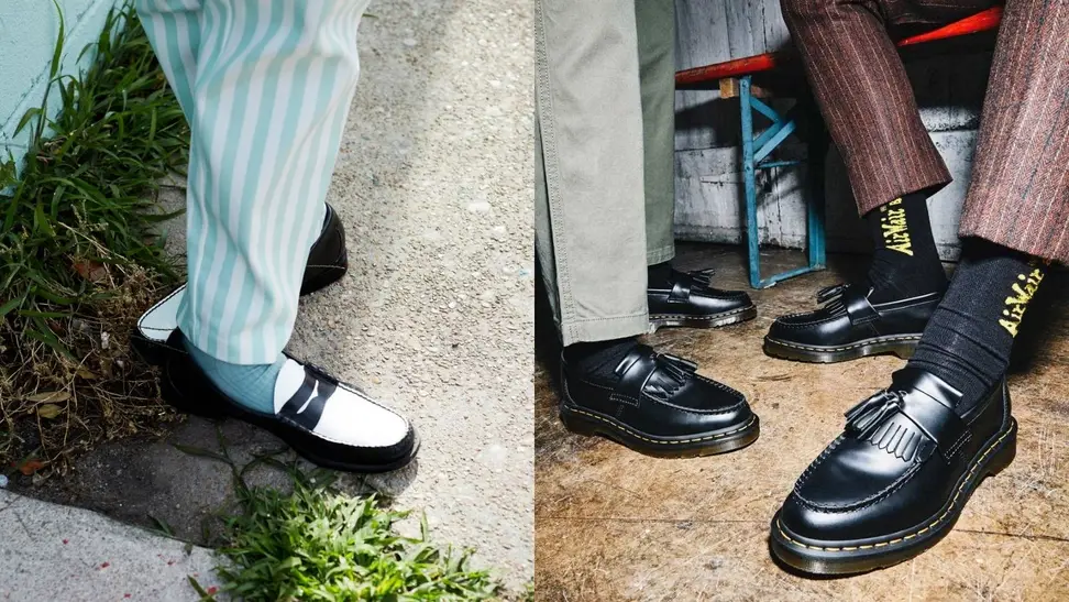 person in blue striped pants and blue socks wearing black and white colorblock Weejun penny loafers, two people wearing black tassel loafers by Dr. Martens