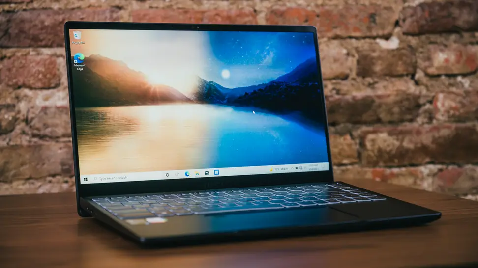 An open laptop on top of a desk