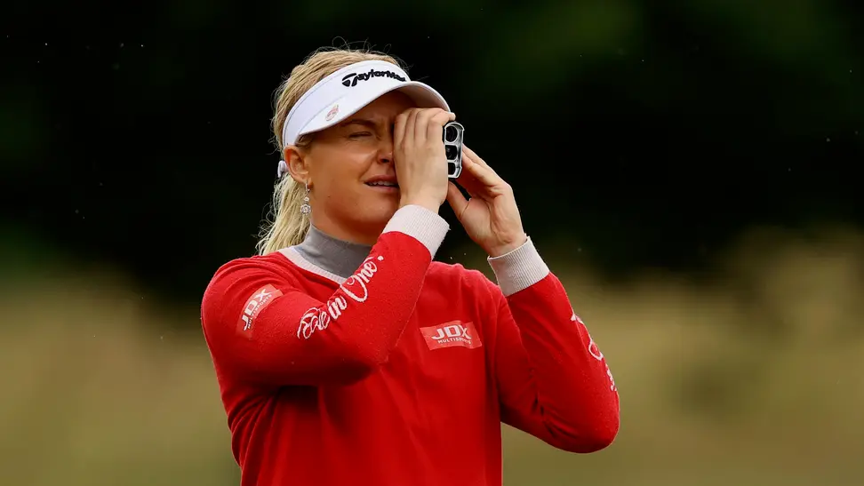 Pro golfer Charley Hull uses a rangefinder during the Rose Ladies Series.