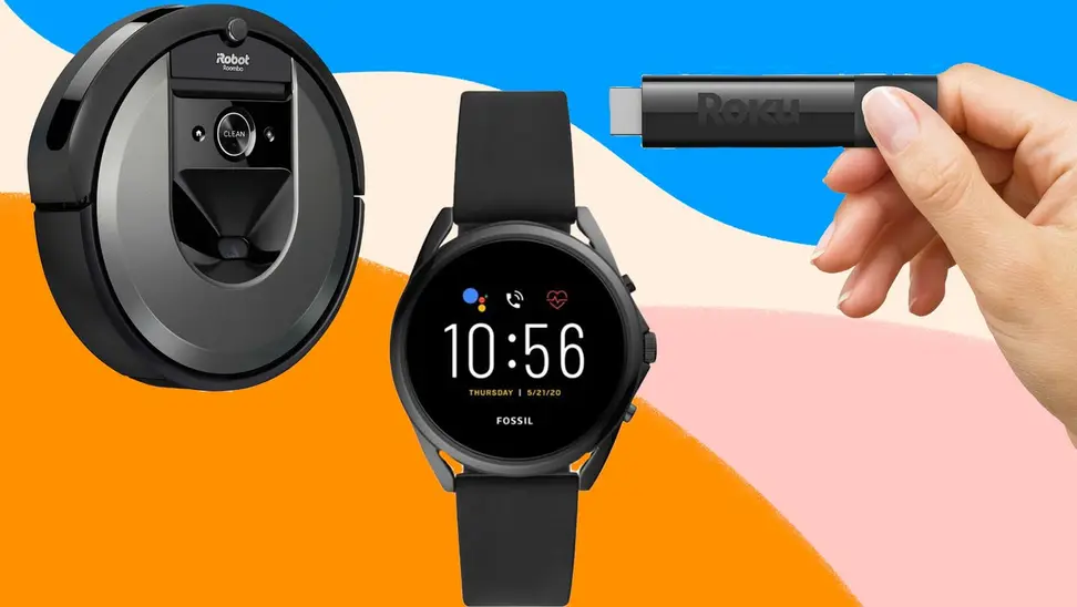 Black robot vacuum, black smart watch and hand holding a black Roku device