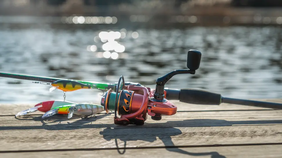 Fishing rod lying on a dock.