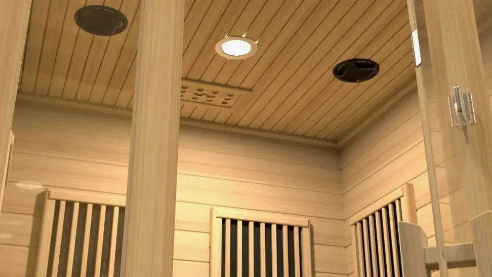 Photo of a home sauna interior with light wood construction.