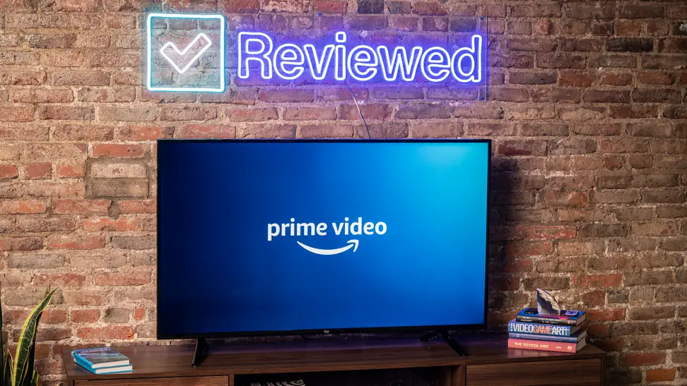 The Amazon Fire TV 4-Series displaying the Prime Video logo in a living room setting