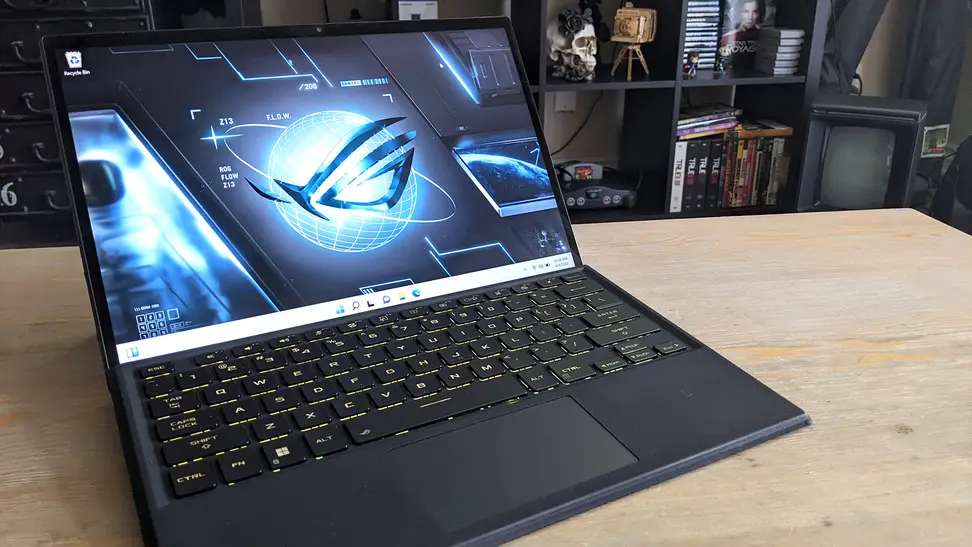 A laptop a on top of a coffee table