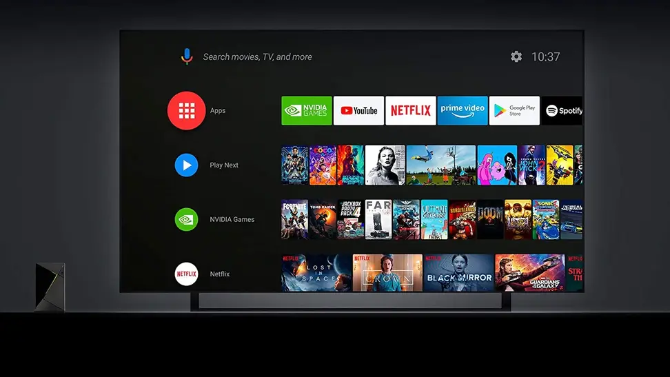 An Android TV box being used on a television to display different streaming services.