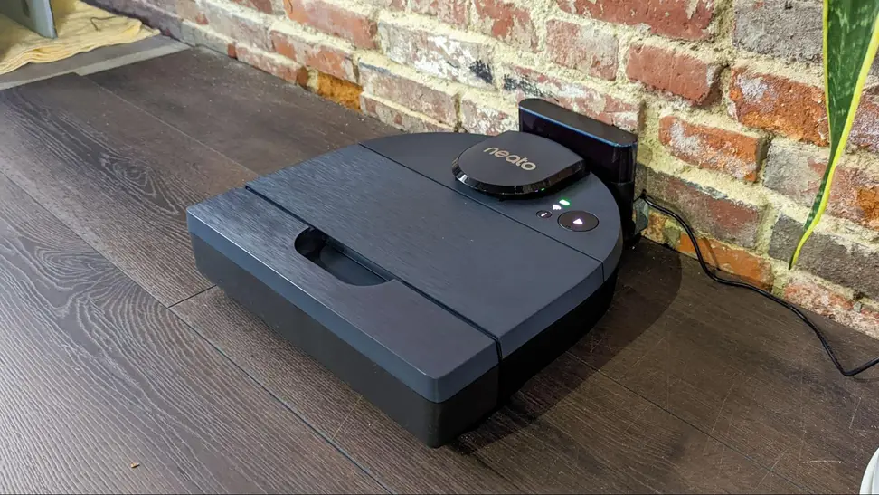 The Neato D8 in its charging dock.