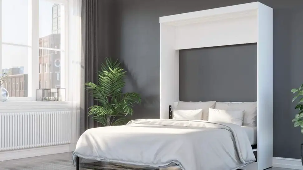 A murphy bed in the guest bedroom of a home.