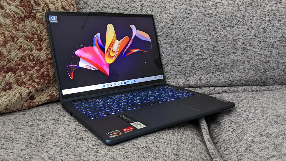 An overhead shot of an open laptop with the screen and keyboard showing.