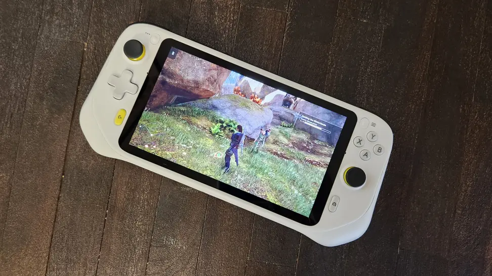A handheld gaming console displaying many objects inside of a room (video game)