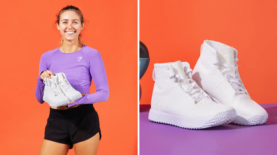 person holdingwhite sneakers/ white sneakers on table