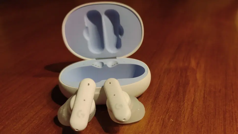 Close-up of the Logitech G Fits earbuds outside of their case.