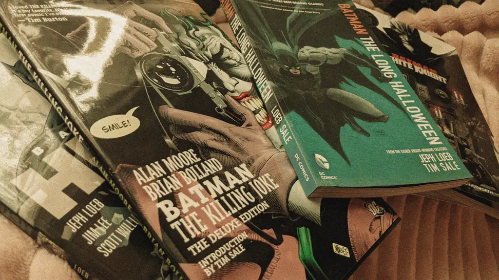 A handful of DC graphic novels: Batman: The Long Halloween, The Killing Joke, White Knight, Hush, and so on.