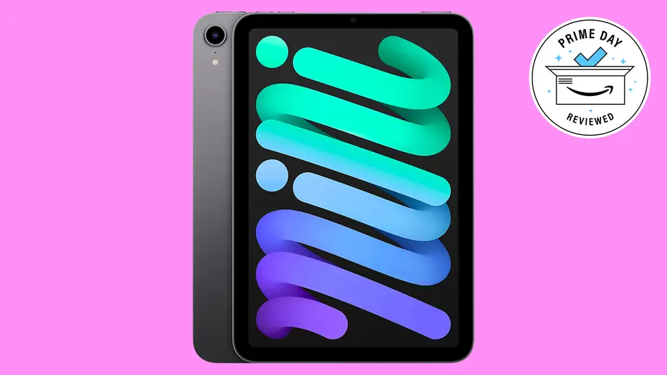 An iPad Mini against a pink background.