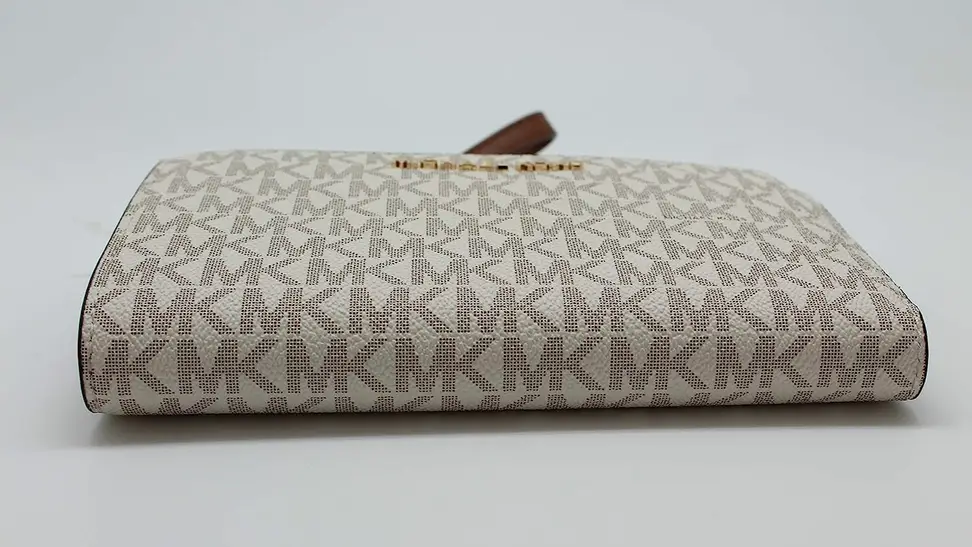 A women's leather wallet by Michael Kors.
