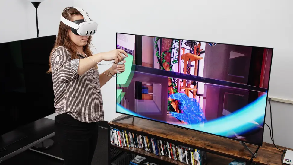 A white VR headset with two controllers on either side, the meta quest 3