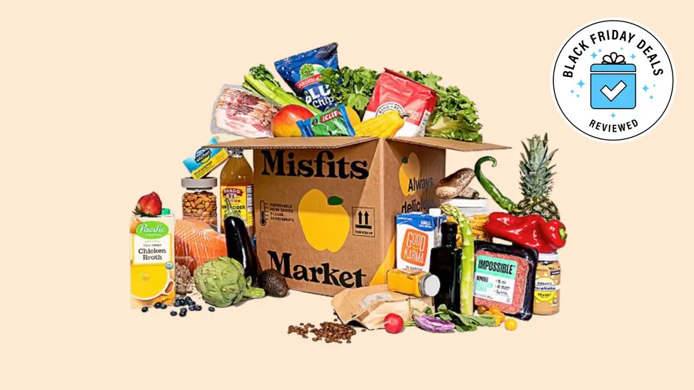 A Misfits Market package with various produce on display with the Black Friday Deals Reviewed badge in front of a colored background.