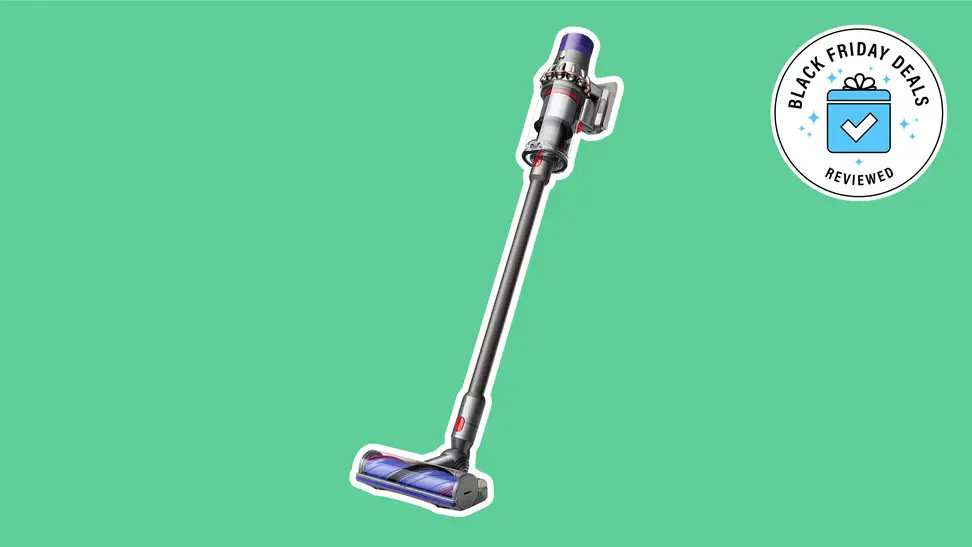 Dyson vacuum on a green background.