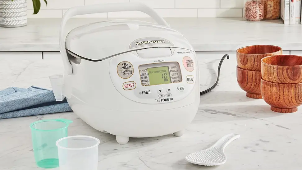 A Zojirushi rice cooker in a kitchen setting