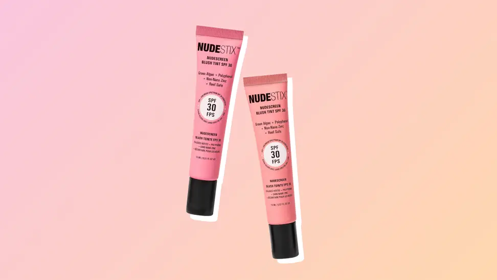 Two Nudestix Nudescreen Blush Tints in pink and orange against a pink and orange background.