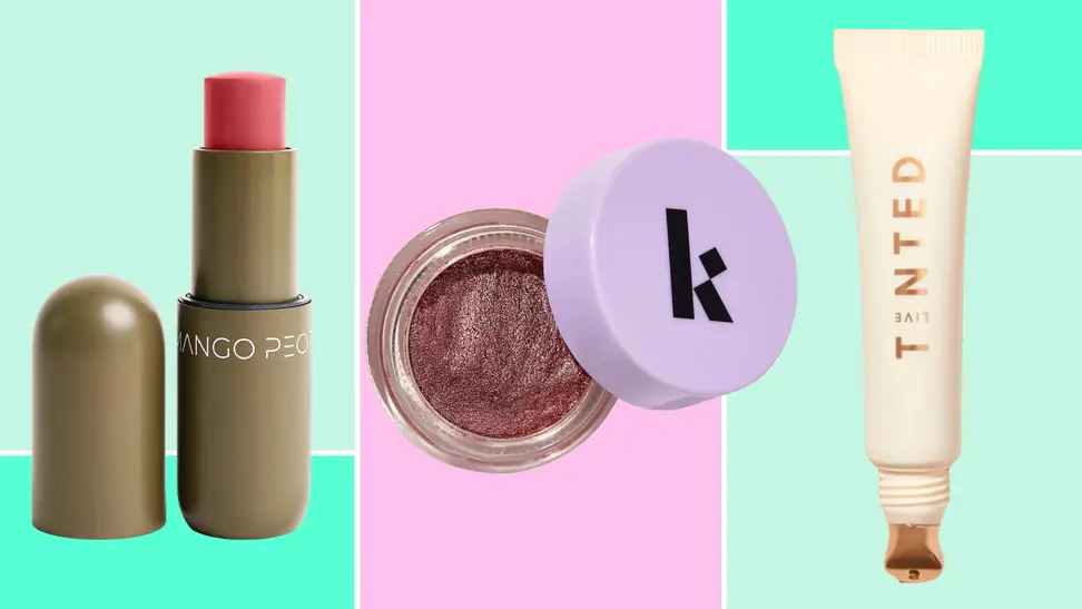A Mango People Mango Cream Blush & Lip Multistick, a jar of Kulfi Beauty Zari Eyes Long-Lasting Crease-Proof Cream Eyeshadow and a tube of Superhue Brightening Eye Cream on top of a colorful background.