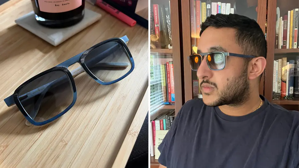 A pair of blue sunglasses on a wooden tray, and also a photo of a man wearing the sunglasses.