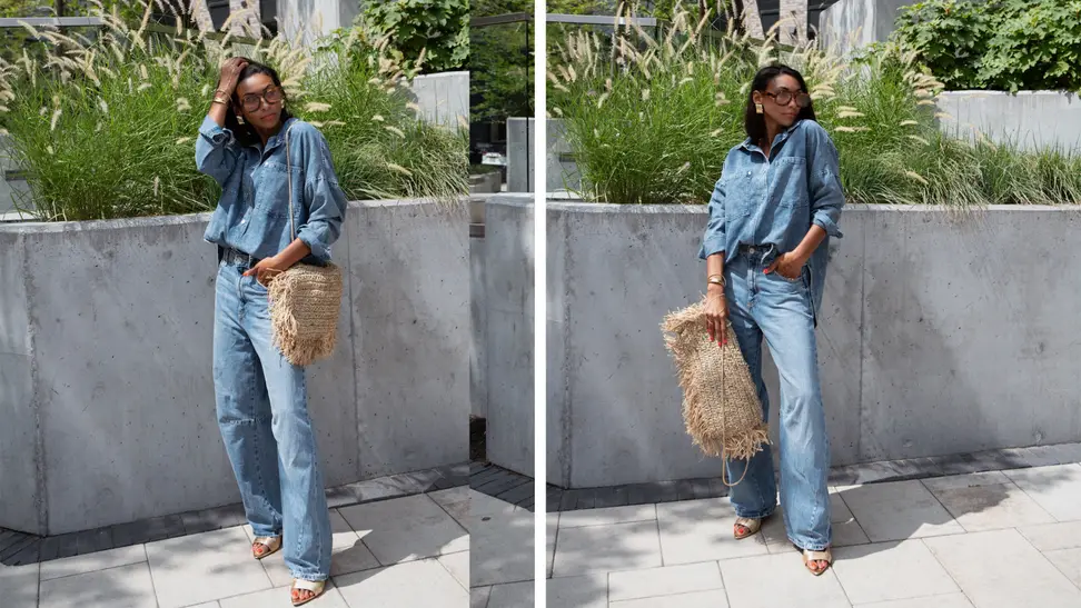 A woman wearing jeans and a denim shirt, gold shoes, sunglasses, and a raffia pillowcase that she turned into a purse.
