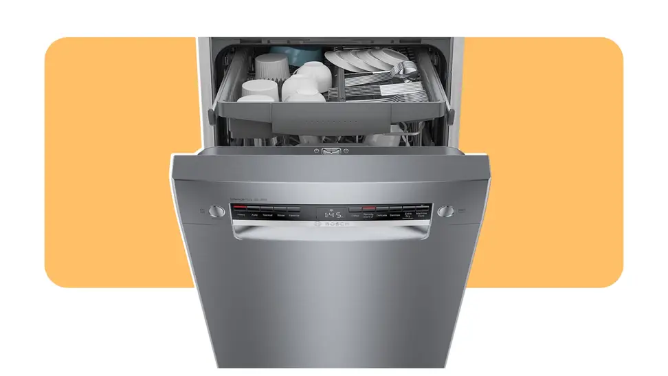 A dishwasher stands open on an orange background